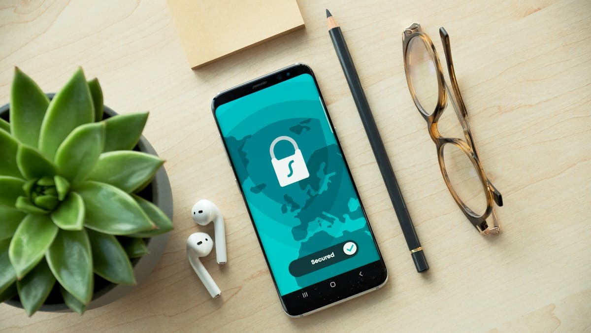 Person reviewing sensitive documents at a desk